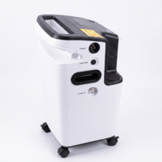 OxyHome 5L home oxygen concentrator side view — oxygen outlet, power protection breaker, auxiliary port and rolling caster wheels