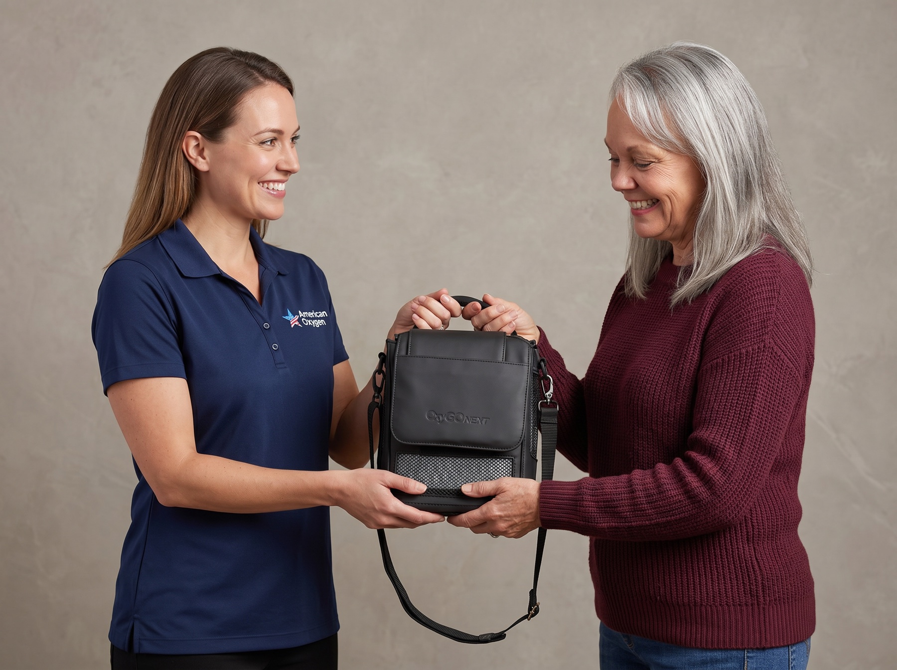 American Oxygen team member handing a cleaned and tested portable oxygen concentrator in its carry bag to a customer in Miami