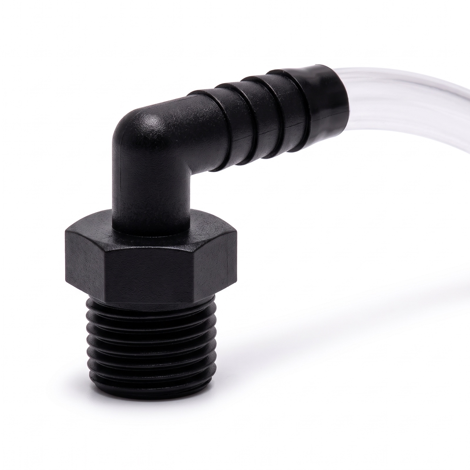 Close-up of the black threaded elbow and barbed fitting on the humidifier connector tube